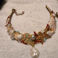 collana collarino con perle e conchiglie 