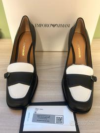 Scarpe in pelle nera e bianca donna