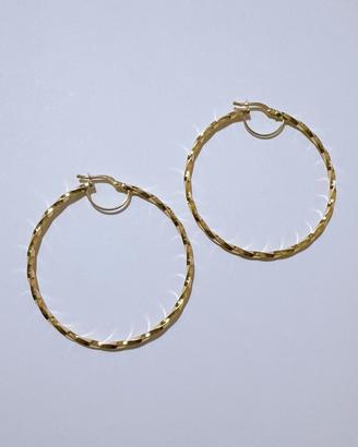 Orecchini cerchio torchon in oro giallo 18kt 750