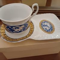 Tazza da tè con piattino porta biscotti