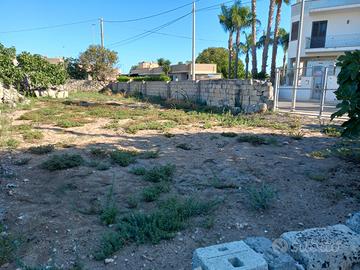 Terreno edificabile con fabbricato rurale