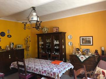 Casa con giardino