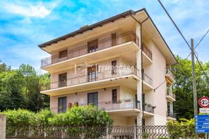 APPARTAMENTO BILIVELLO CON GIARDINO E POSTO AUTO