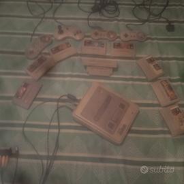 console super Nintendo+8giochi+accessori 