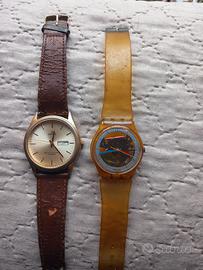 Due orologi swatch e Lorus