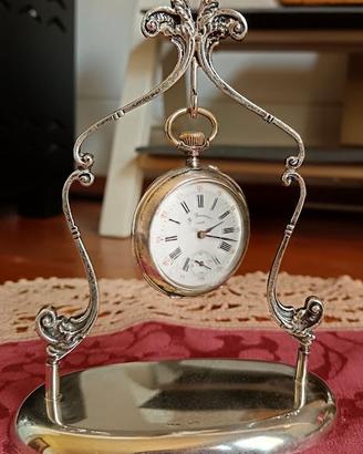 Orologio da tasca d'epoca con supporto in argento