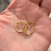 Orecchini lavorati a cerchio argento placcato oro