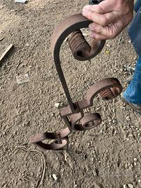 Ricci di ferro battuto a mano