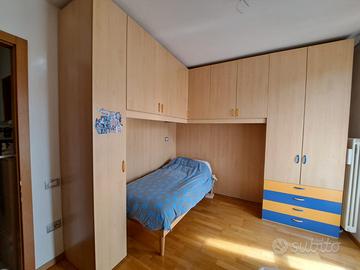 Camera singola con armadio a ponte