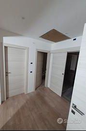 Porte qualità pronte Spissu finestre persiane posa