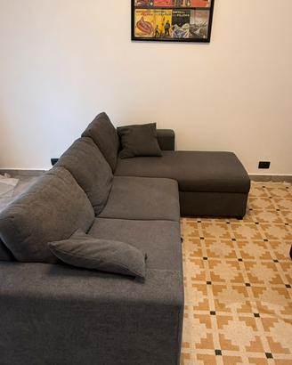 Divano letto Liberty con penisola contenitore