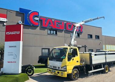 Isuzu Q75y6 gru e cassone fisso TAGICAR 
