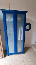  armadio e specchio rotondo