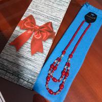 collana con sacchetto e shopper