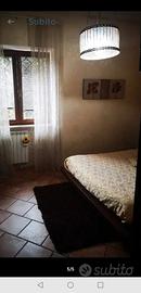 Casa con giardino
