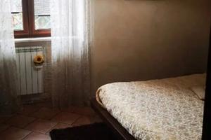 Casa con giardino