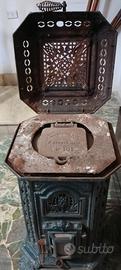 stufa in ghisa smaltata d'antiquariato 