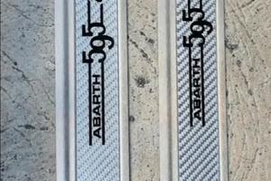 BATTITACCO IN CARBONIO ORIGINALI 500/595 ABARTH 