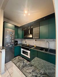 Cucina , soggiorno e mobiletto basso 