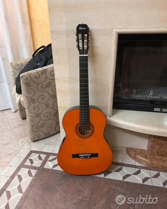 Chitarra+custodia+poggia piede