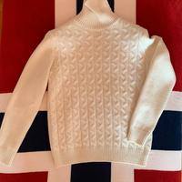 Maglione dolcevita a trecce