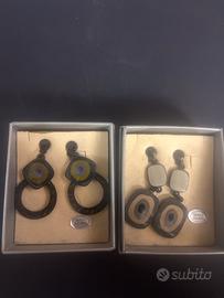 Due baia di orechini narchio flama