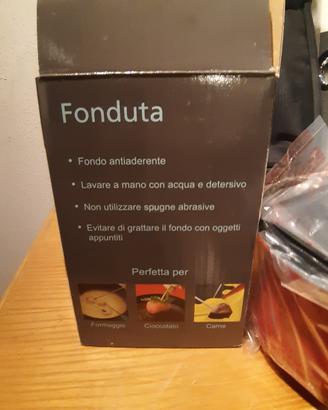 set fonduta completo di forchette