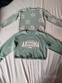 Coppia di felpa e maglione di differenti marche