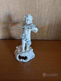 Statuina angelo putto in porcellana Bassano