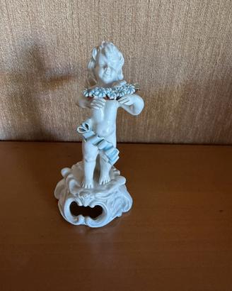 Statuina angelo putto in porcellana Bassano