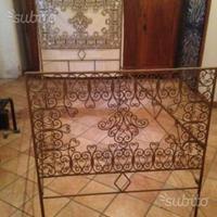 Letto in ferro battuto dorato