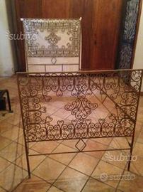 Letto in ferro battuto dorato