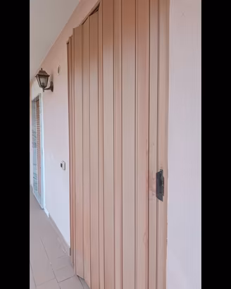PORTA SCORREVOLE A SOFFIETTO