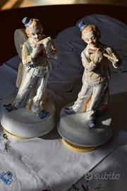 Coppia statuine carillon vintage in porcellana