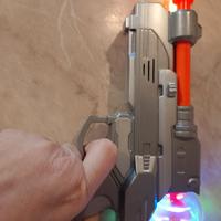 Pistola giocattolo con luci