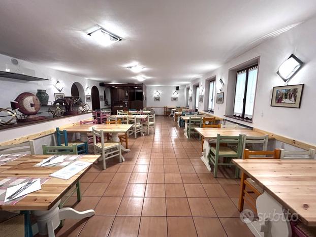 Ristorante pizzeria con corte esterna