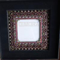 Cornice con pietre semi preziose