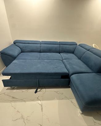 Divano con penisola e pouf contenitore