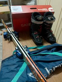 sci, scarponi e bacchette