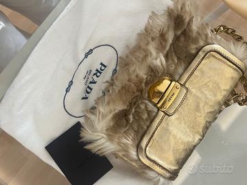 Borsa Prada e Louis Vuitton