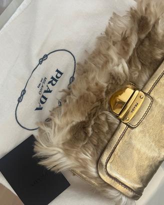 Borsa Prada e Louis Vuitton