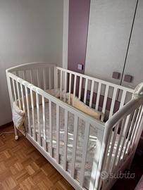 Lettino infazia con sbarre in legno