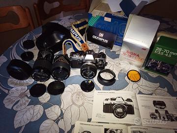 Olympus om10 + grandangolo + tele