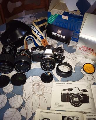 Olympus om10 + grandangolo + tele
