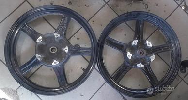SYM HD Evo 125 '10 : pinza scudo faro centralina