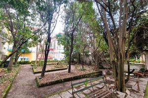 Appartamento con terrazzo e giardino