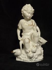 Statuina Limoges Fanciullo con Oche cm 22