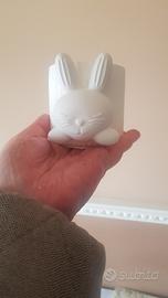 vasetto in gesso con simbolo 