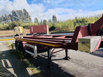 Semirimorchio porta container ribaltabile