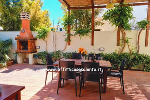 Baia Verde Villetta con giardino e posto auto